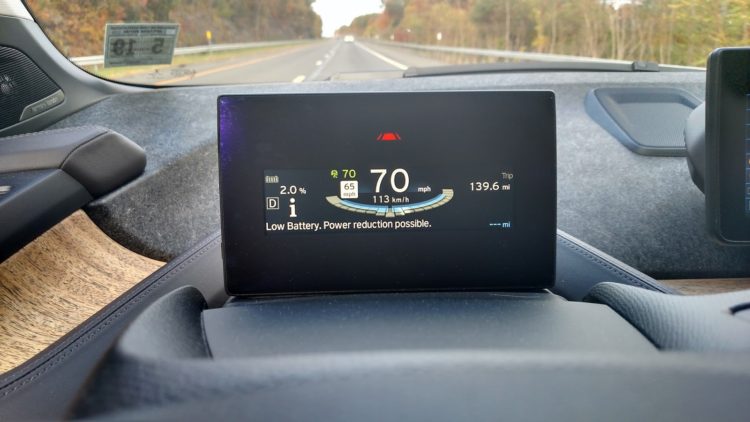 An audible warning and this visual alert comes on when the state of charge drops below 3%, warning the driver that reduced power is possible. You can also see the SOC display in the top left corner. That was also added to help the driver avoid reduced power mode. These warnings were added in 2015, slightly less than a year after the i3 launched in the US. 
