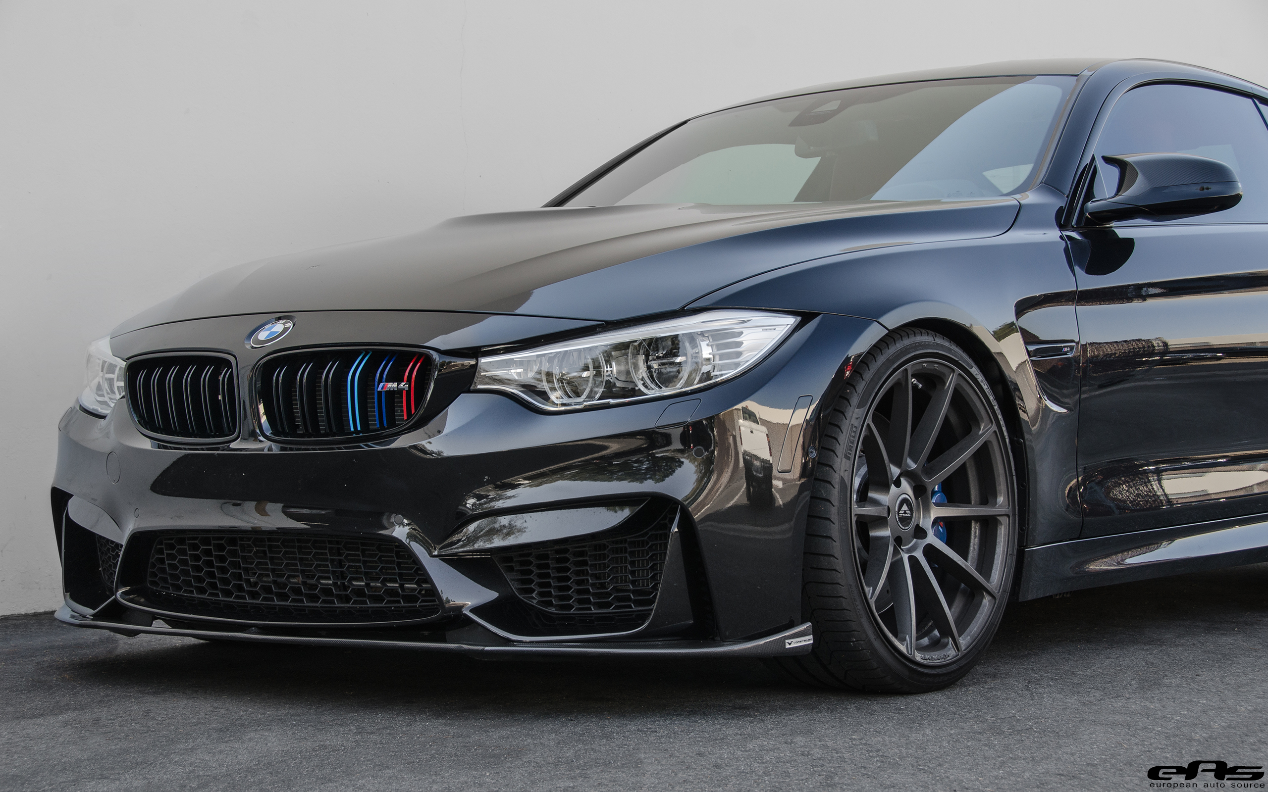 Blacked Out BMW M4 With Vorsteiner Aero Parts And Custom Wheels.