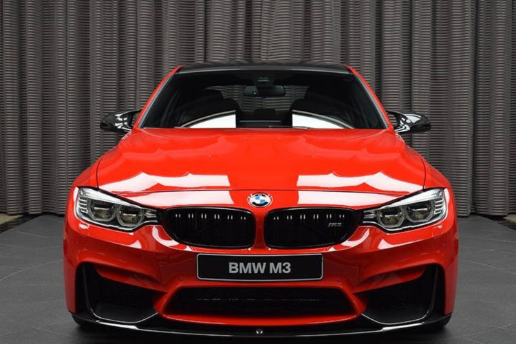 bmw m3 with competition package and ferrari red paint 750x500