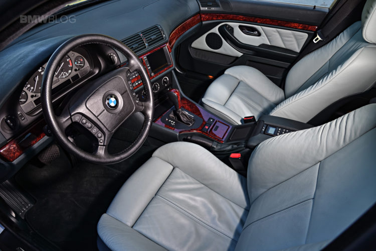 Parked for years, doorless BMW 5 Series E39 has its filthy interior cleaned