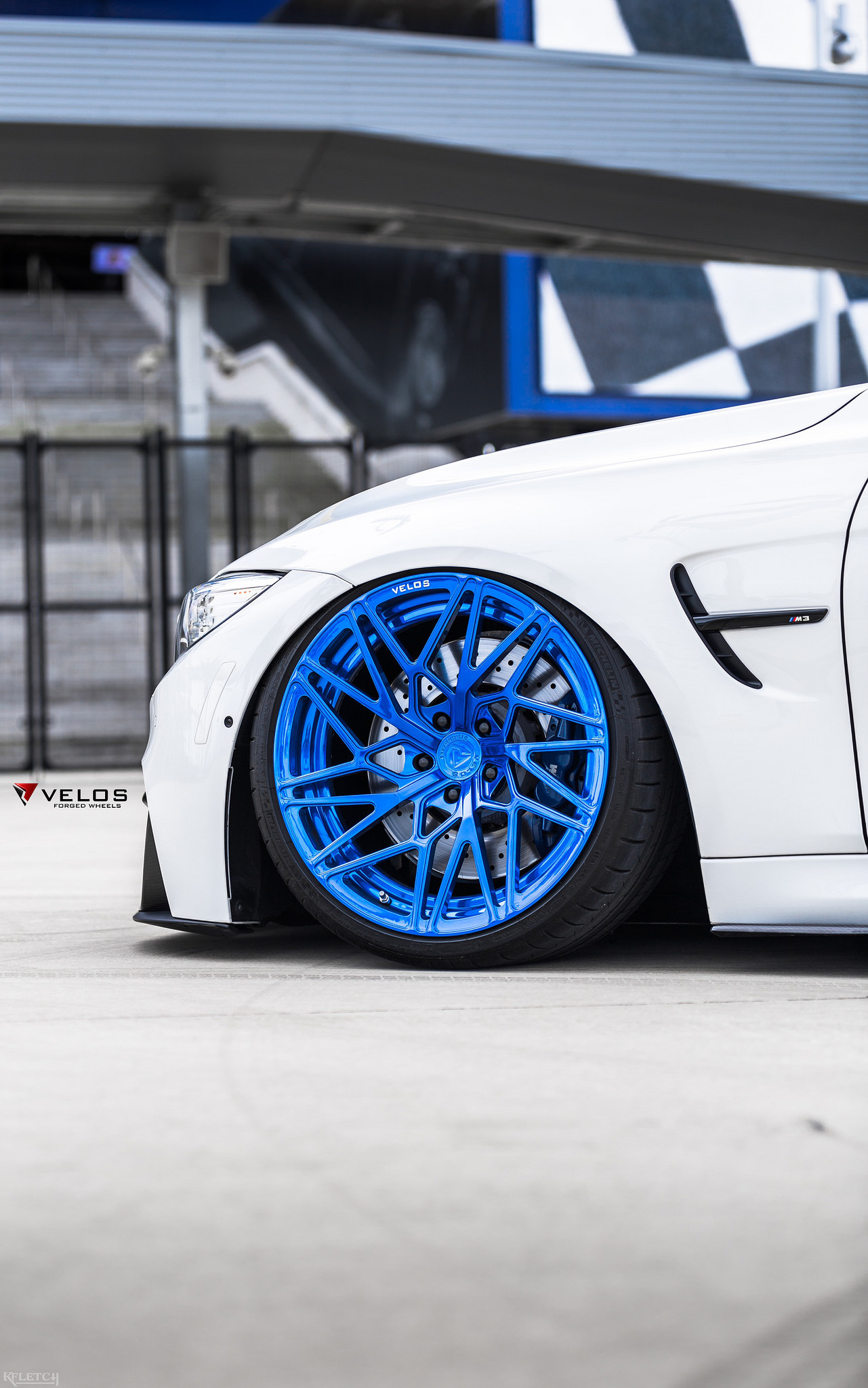 Alpine White BMW M3 With Candy Blue Velos Designwerks Wheels