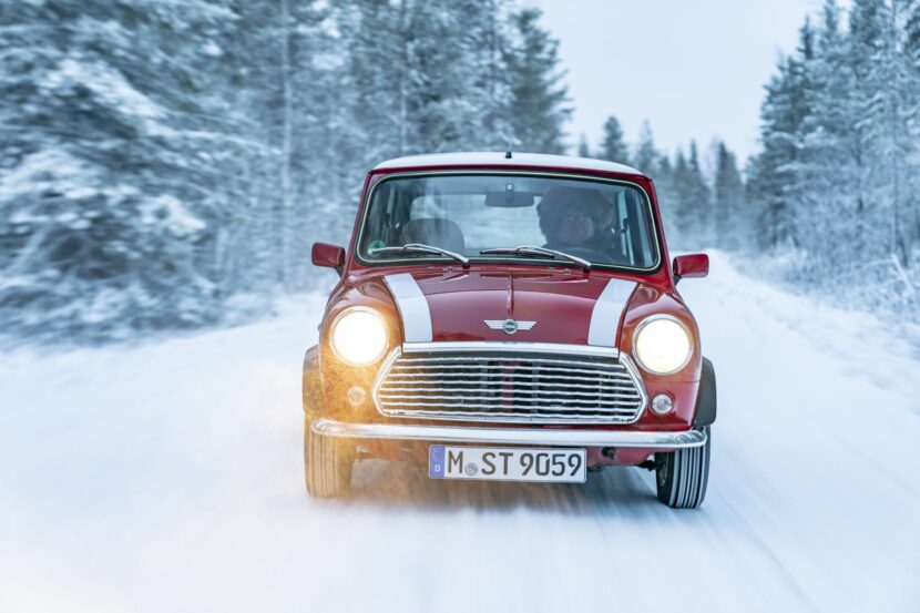 Rauno Altonen and a classic Mini pose for Christmas in the Finnish forests