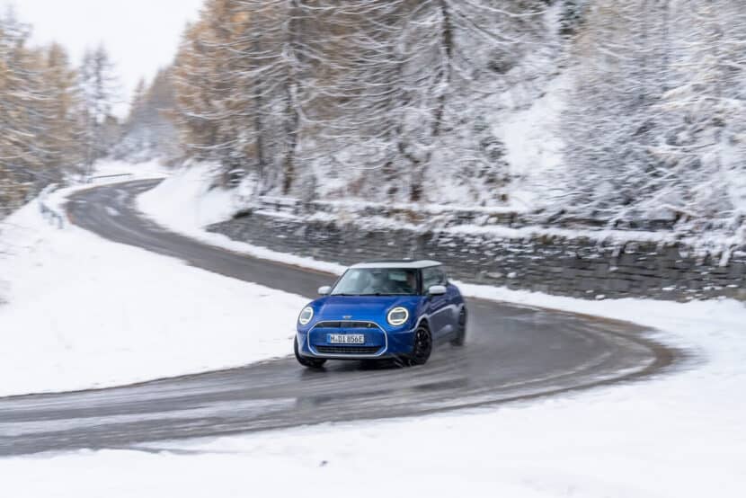 MINI Cooper in blue downhill in the snow