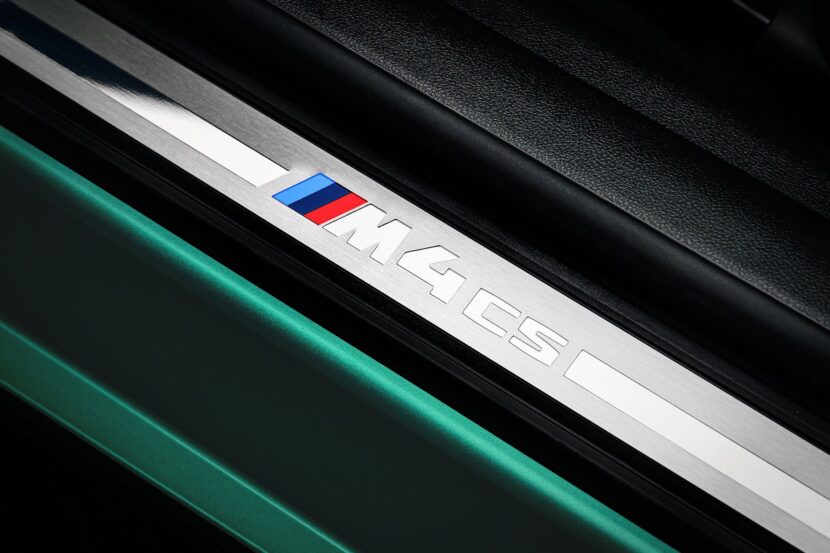 BMW M4 CS Riviera Blue And Isle Of Men Green Pose Together