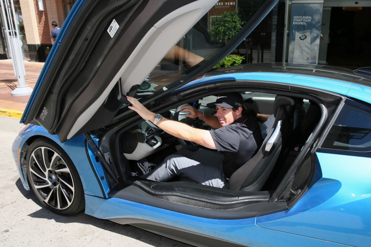 Golf star Rory McIlroy takes the BMW i8 for a ride